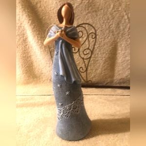 Ceramic angel with dove in hand
